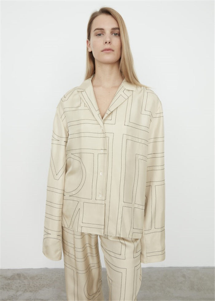 TOTEME Silk Twill Monogram Blouse – Embroidered Ivory Detailing & Lapel Collar