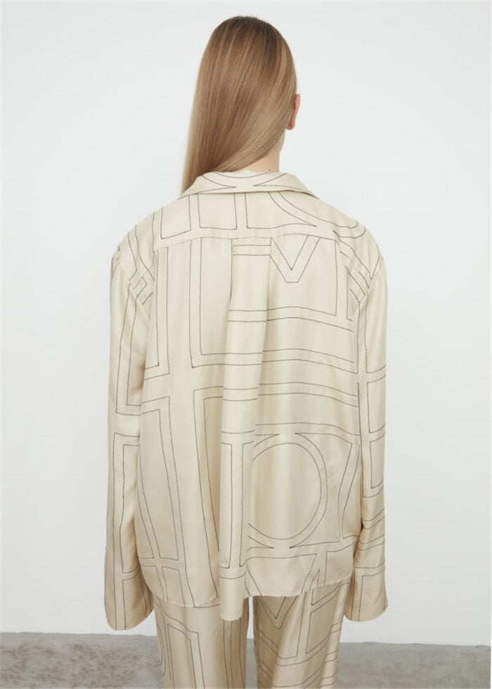 TOTEME Silk Twill Monogram Blouse – Embroidered Ivory Detailing & Lapel Collar