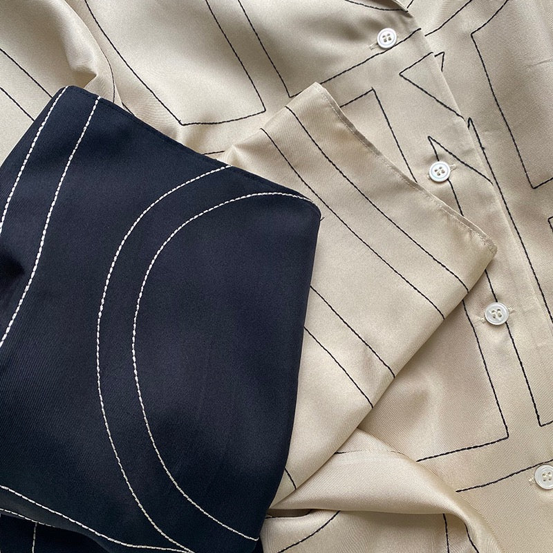 TOTEME Silk Twill Monogram Blouse – Embroidered Ivory Detailing & Lapel Collar