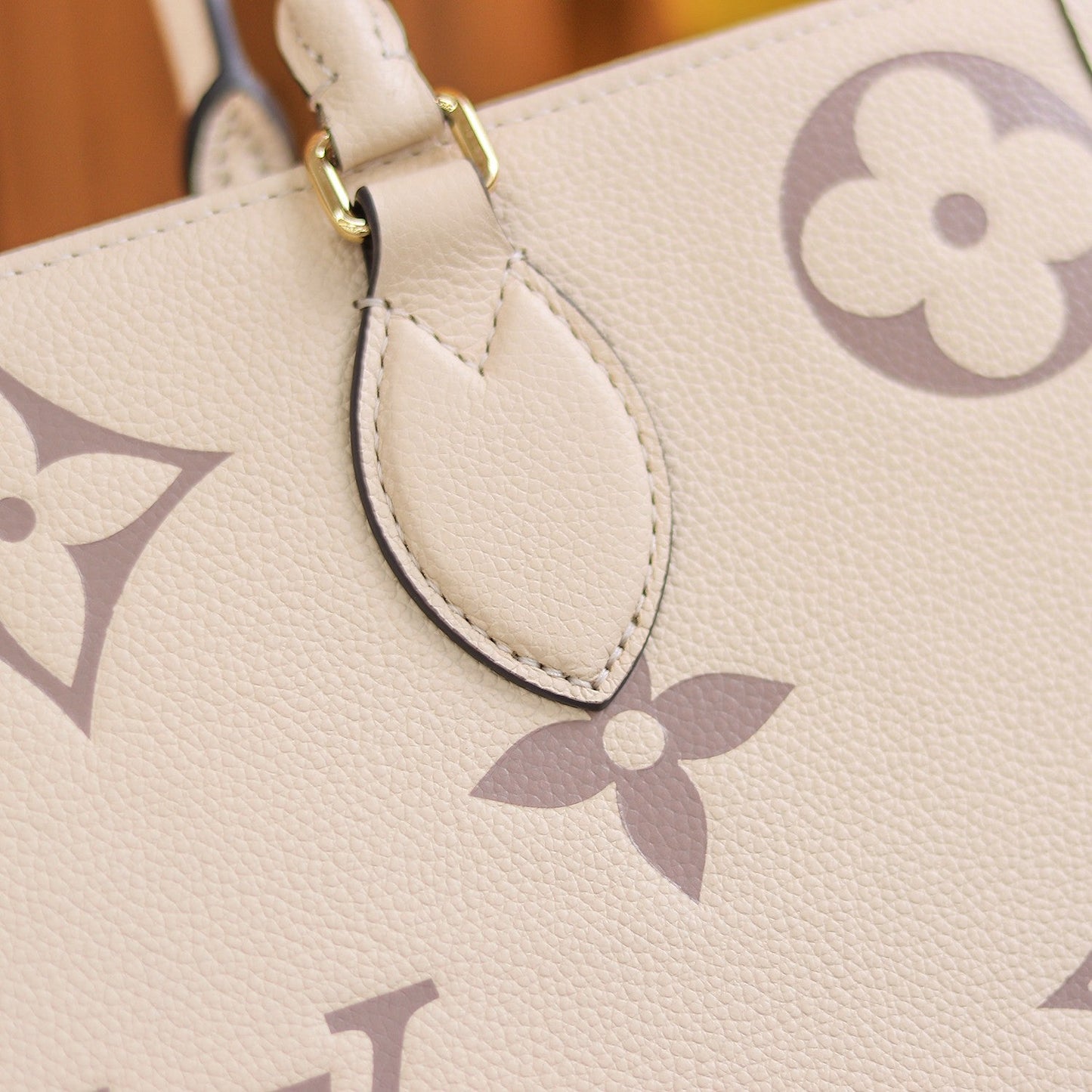LV OnTheGo MM Creme/Rose Pink