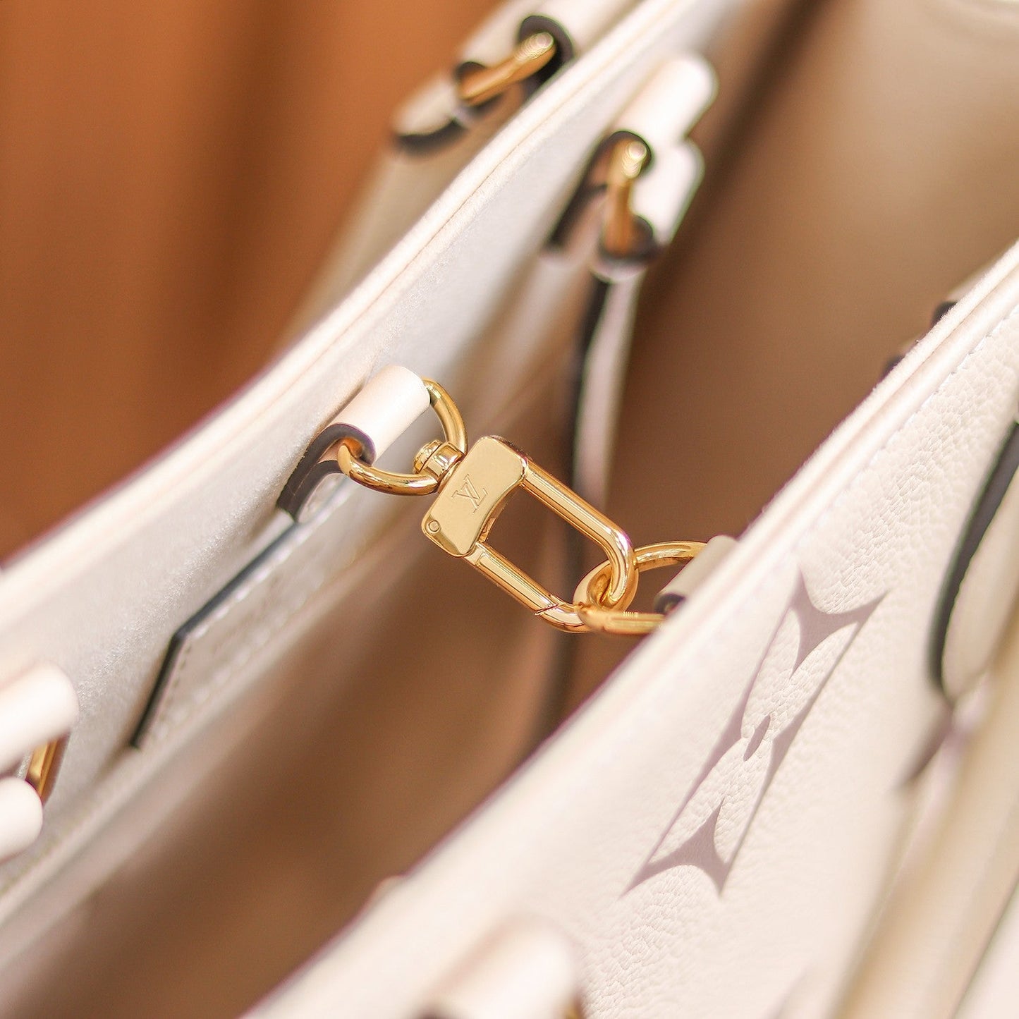 LV OnTheGo MM Creme/Rose Pink