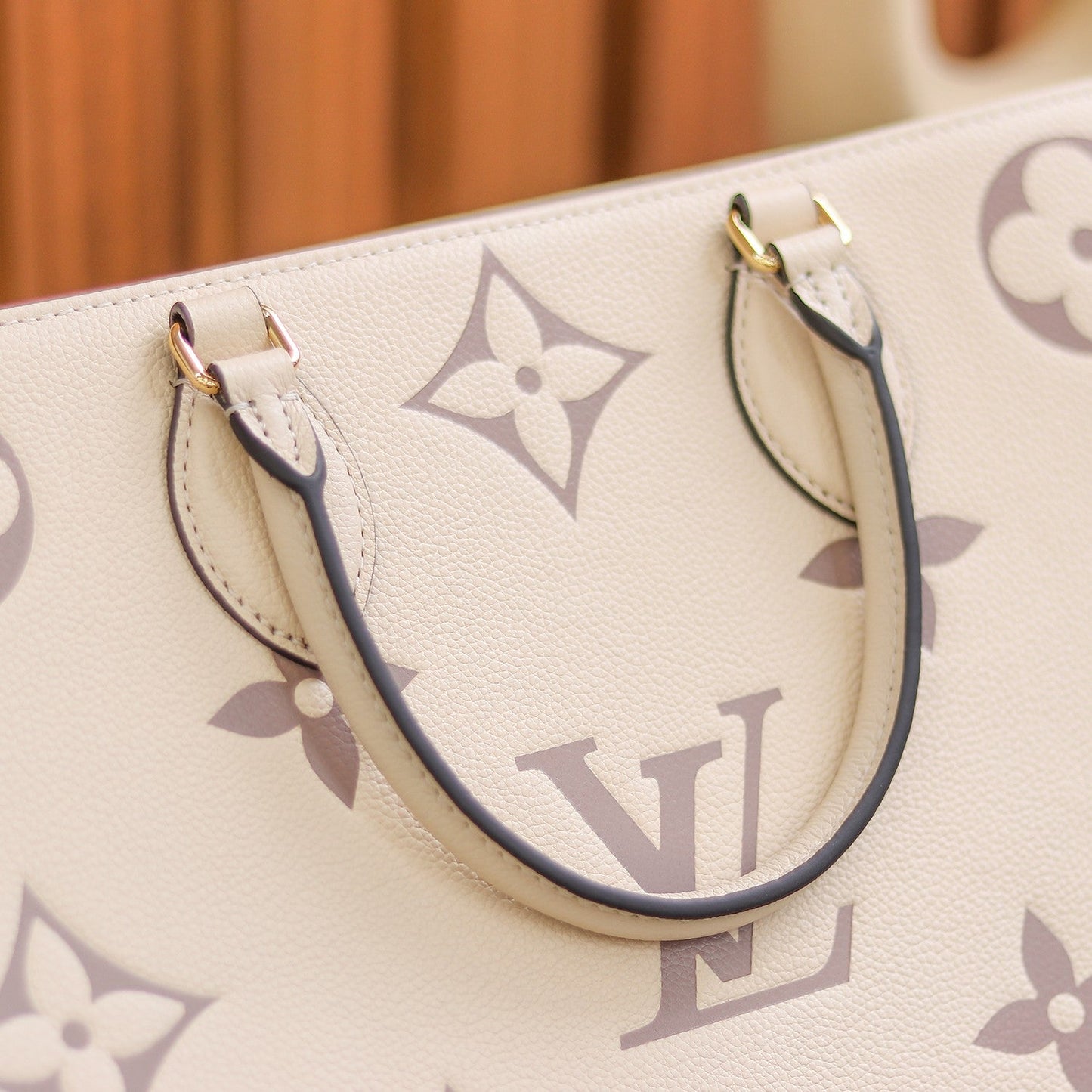 LV OnTheGo MM Creme/Rose Pink