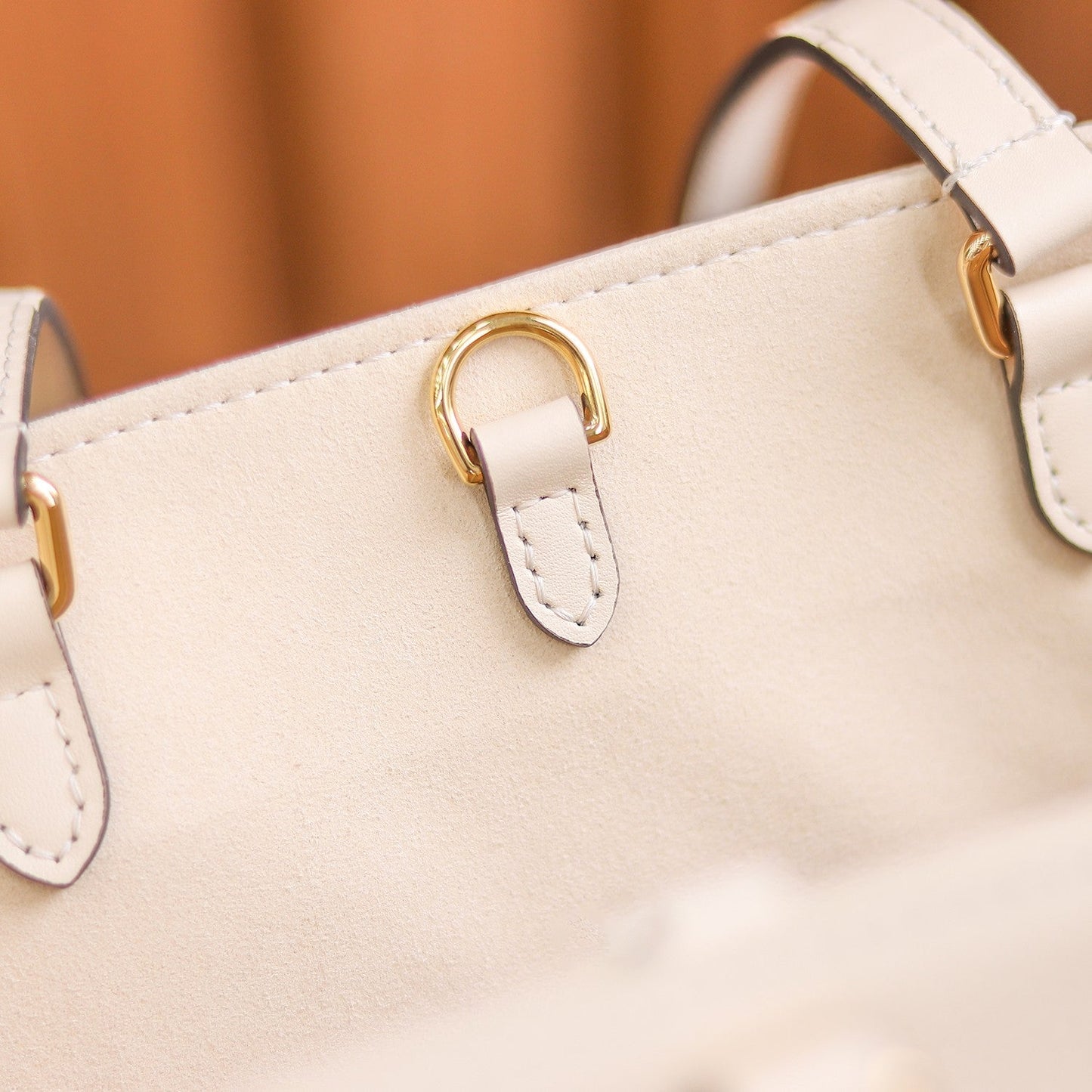 LV OnTheGo MM Creme/Rose Pink
