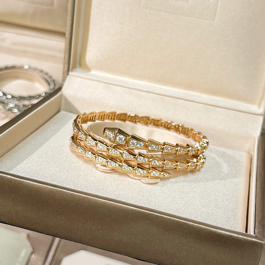 BULGARI Serpenti Viper Two-Coil 18kt Gold Bracelet with Pavé Diamonds