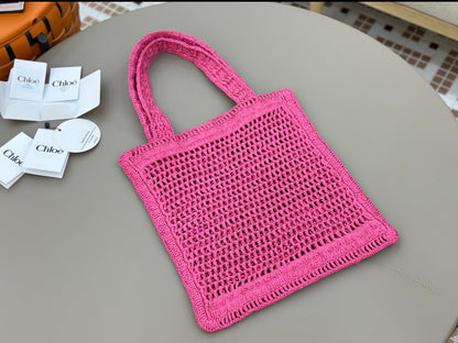 Banana Tote Bag In Raffia Fucshia