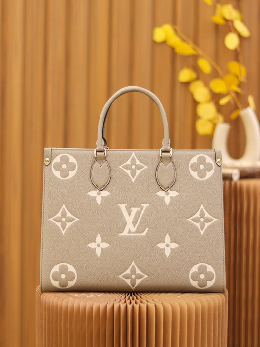 LV  OnTheGo MM Dove/Cream