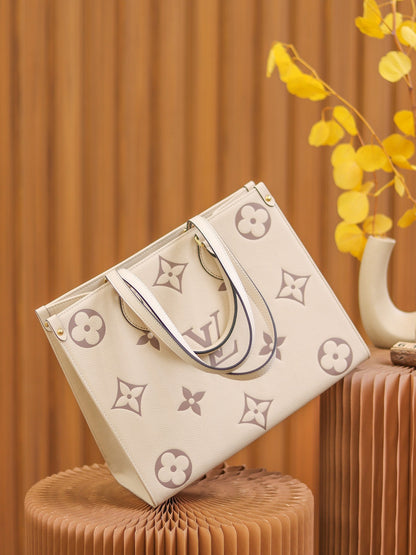 LV  OnTheGo MM Creme/Rose Pink