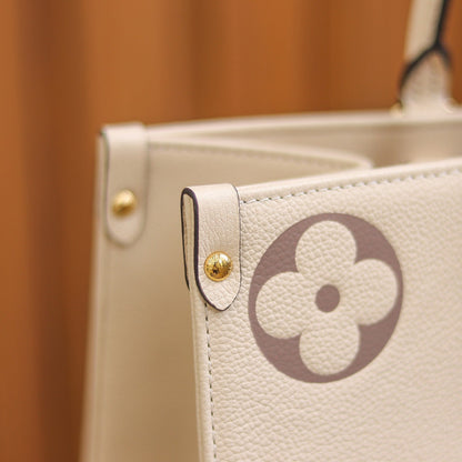 LV  OnTheGo MM Creme/Rose Pink