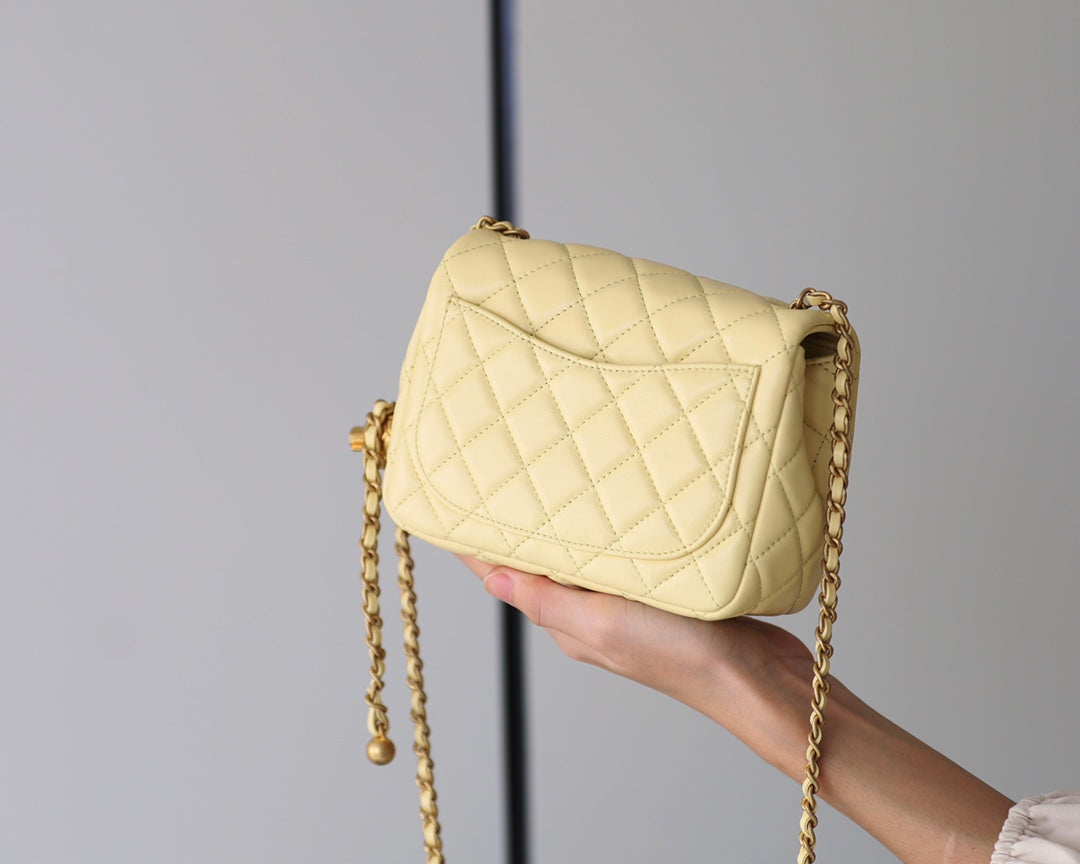 Chanel Mini Light Yellow Quilted Calfskin Classic by Ann's Fabulous Finds