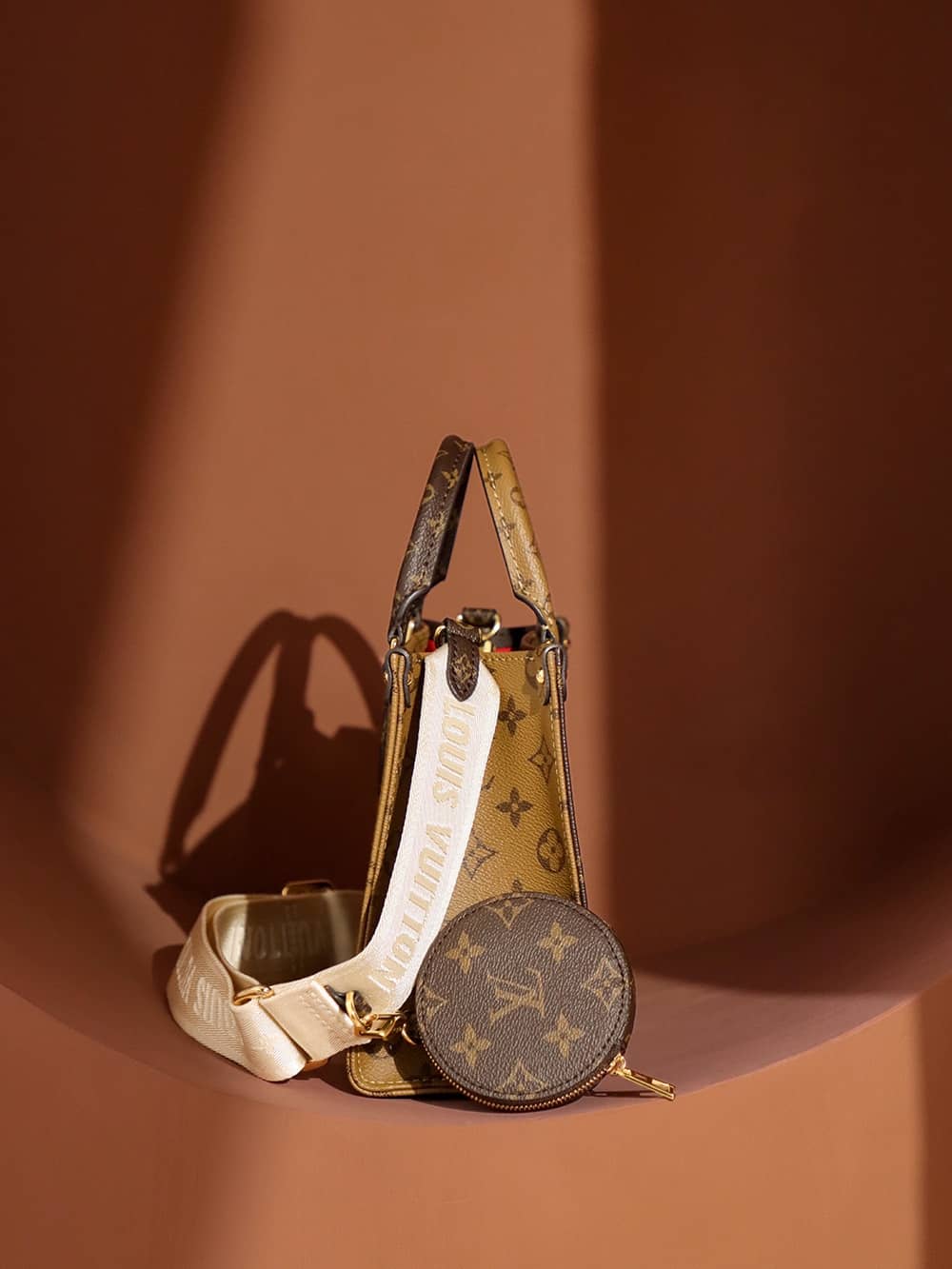Louis Vuitton OnTheGo PM Monogram/Monogram Reverse in Coated Canvas with  Gold-tone - US